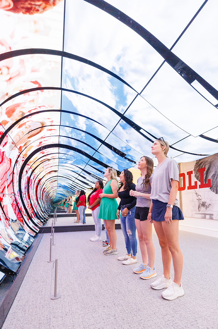 Students in the Roll Tide Room at the Randall Welcome Center